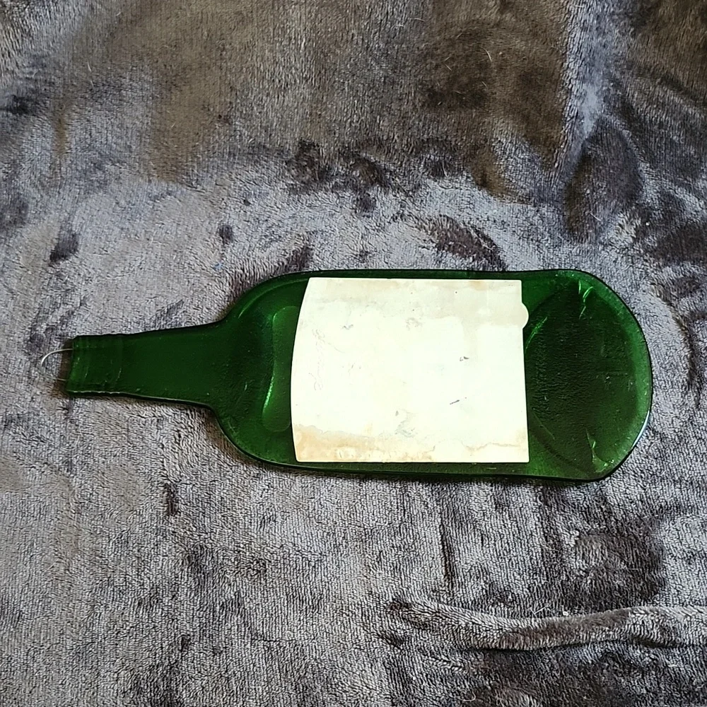Flattened Jameson whiskey bottle